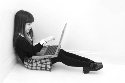 Child using laptop - internet safety